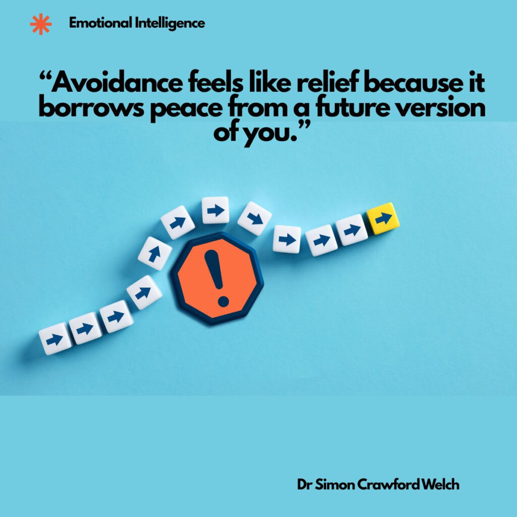 White dice printed with blue arrows curving around an orange warning sign marked with an exclamation point, ending in a single yellow arrow tile, all on a light blue background. The image represents the detour we take around a difficult truth, and the cost that waits at the end of the path we chose instead. The quote over the image reads, "Avoidance feels like relief because it borrows peace from a future version of you." By Dr Simon Crawford Welch.